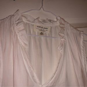 Sleeveless white blouse